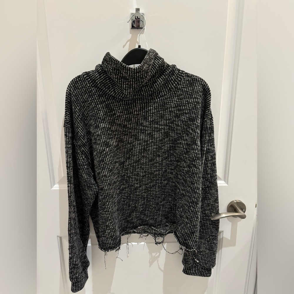 Distressed knit sweater